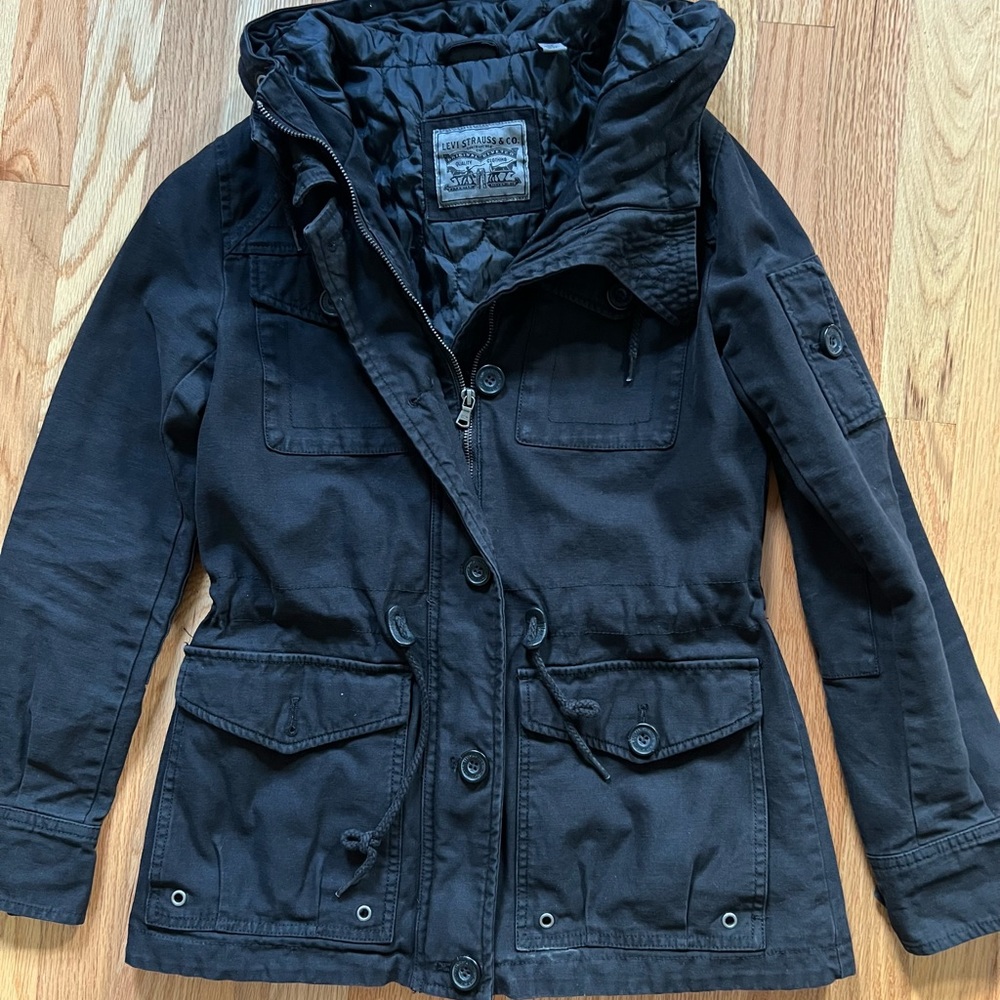 Black Hooded Levi’s cargo jacket with cinch-able waist